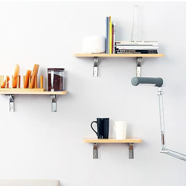 Zložljivi večnamensk konzolni nosilci za polico